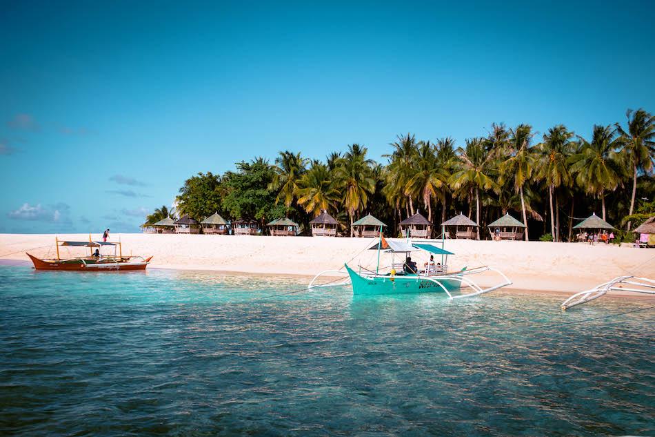 Daku Island Siargao Beach and boats