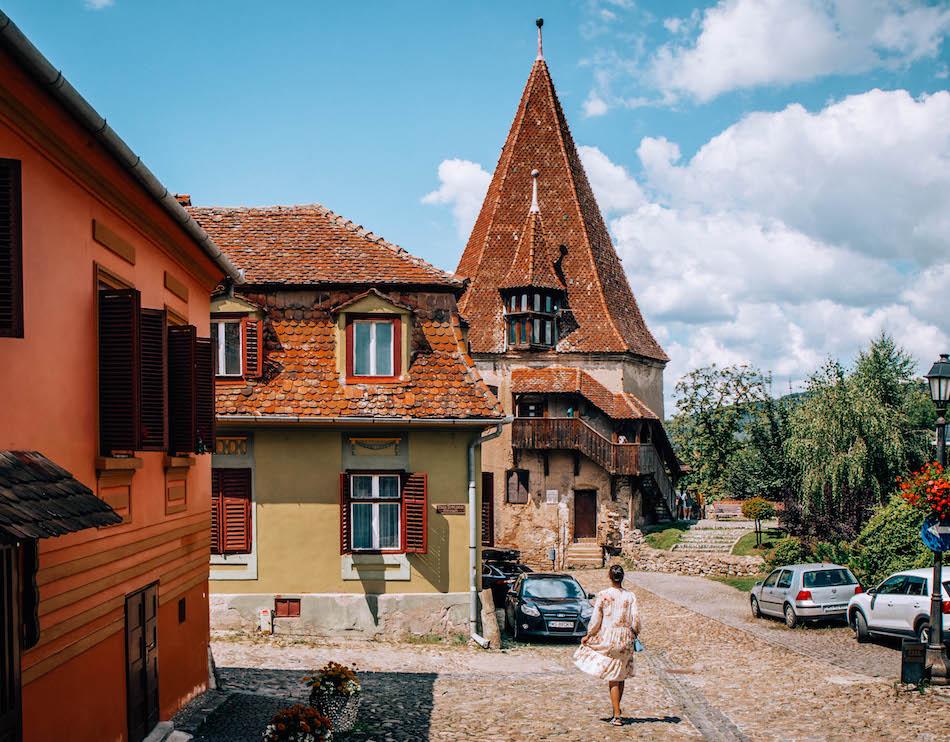 Aurelia Teslaru near Bookmakers' Tower in Sighisoara Fortress Romania