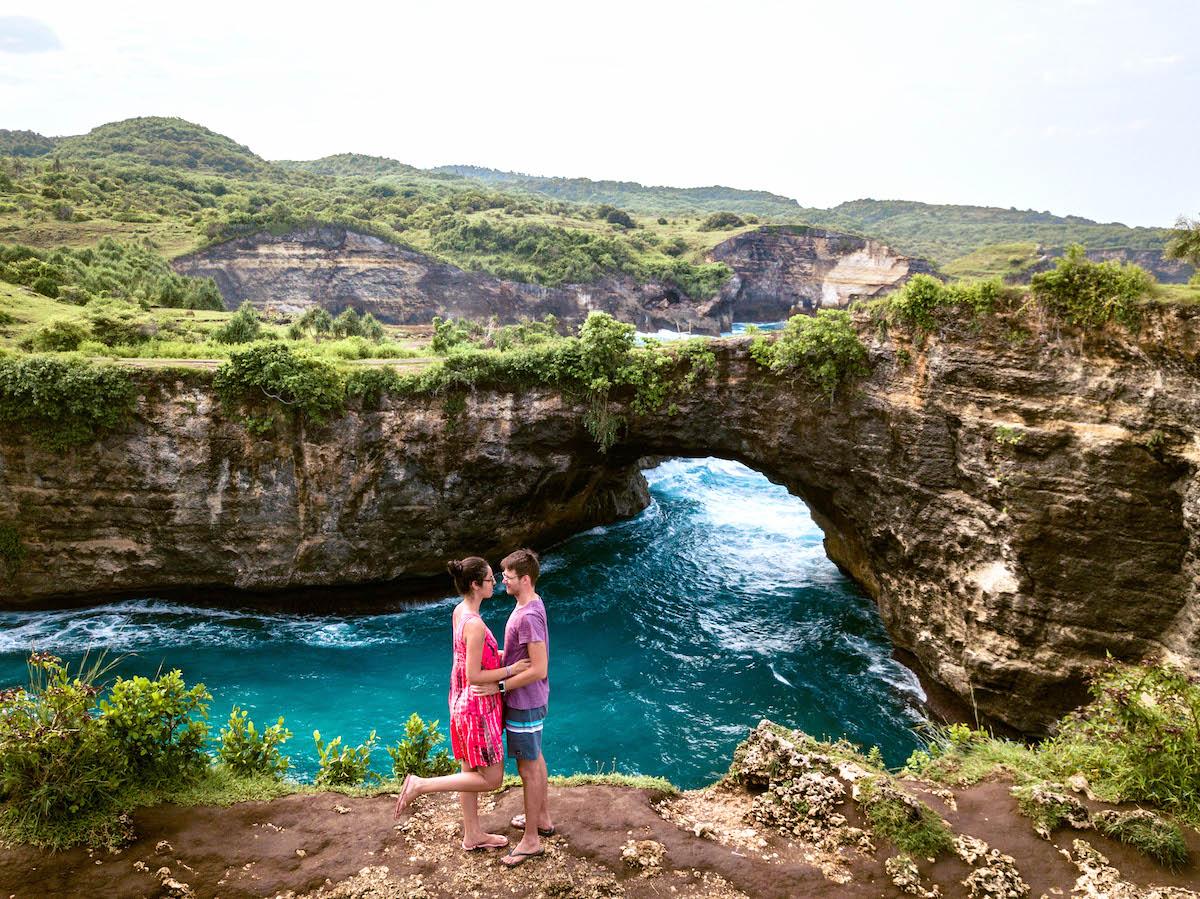 Couple at the Broken Beach Nusa Penida arch