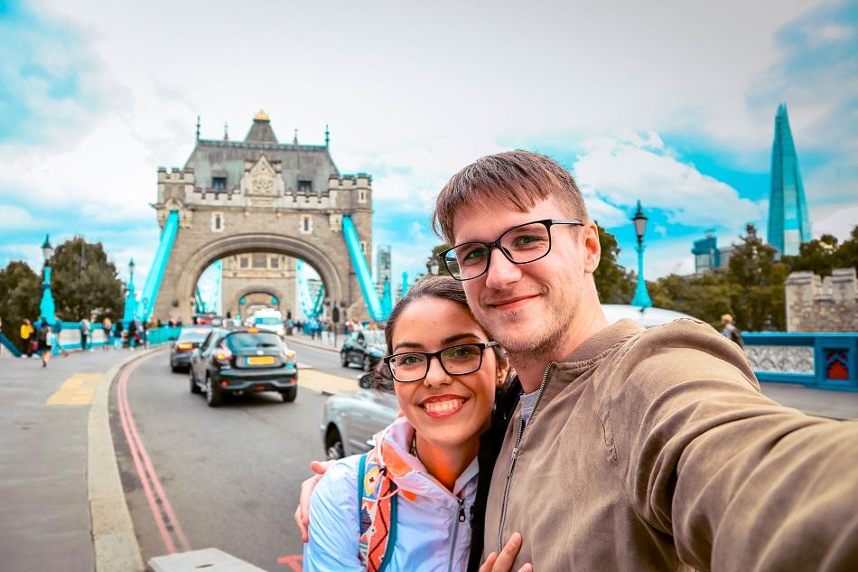 Couple in front of Tower Bridge, London