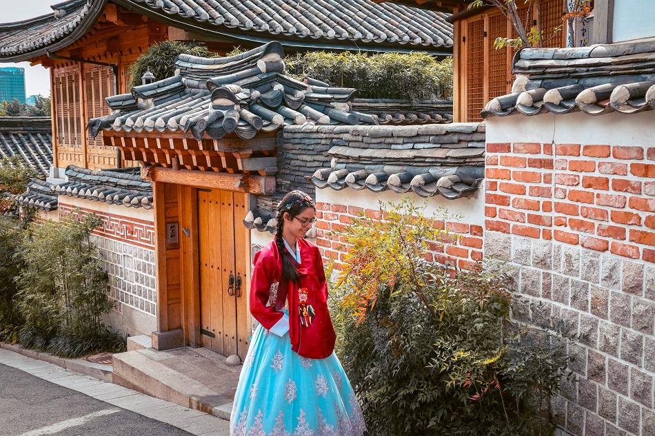 Foreign girl wearing a hanbok at Bukchon Hanok Village