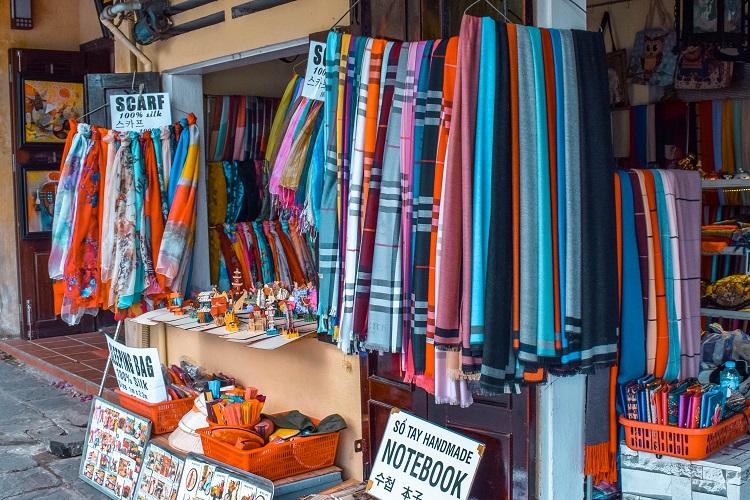 shopping for scarves at a Hoi An market