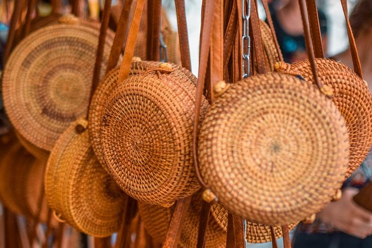 Straw bag shopping at a Hoi An market