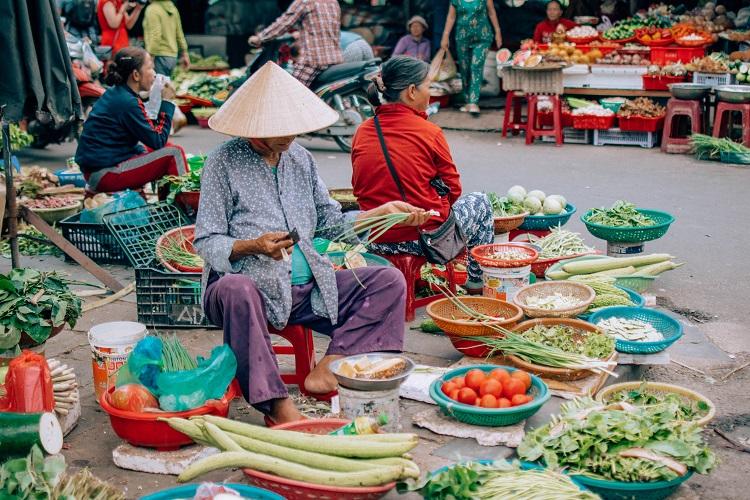 Hoi An woman selling vegetables in the market