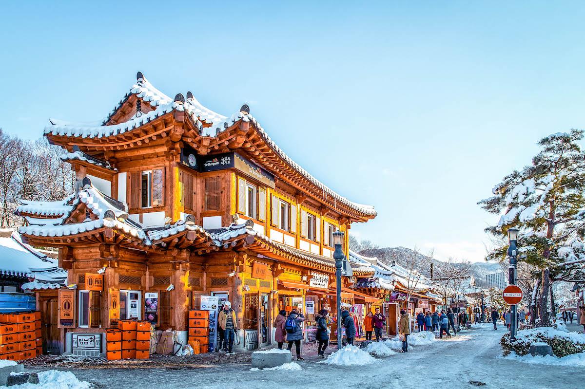 The city of Jeonju in winter. Wooden traditional gate in Jeonju in winter - things to do in Korea in Winter, winter destinations in Korea, winter activities in South Korea