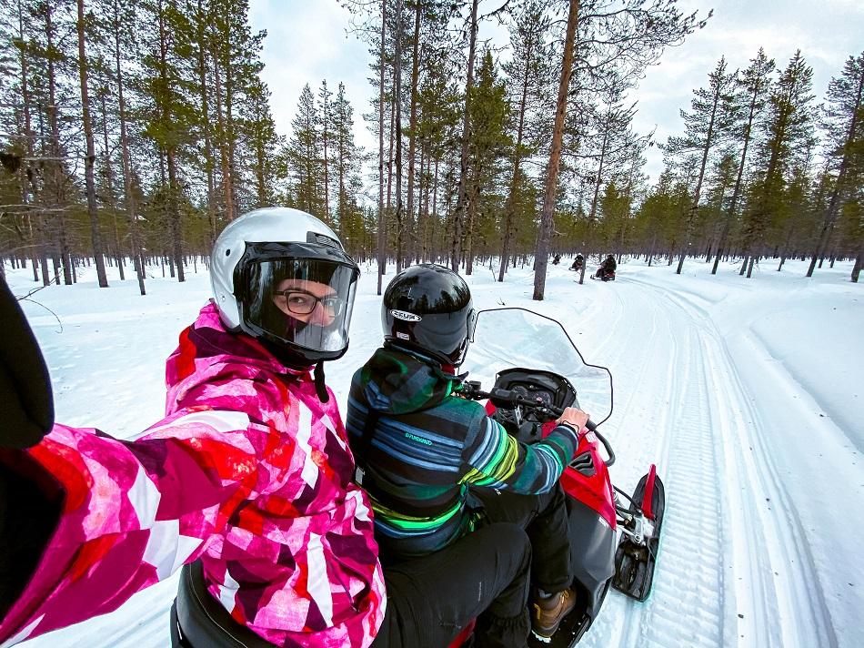 Aurelia Teslaru and Dan Moldovan snowmobiling in Lapland at Kakslauttanen Arctic Resort