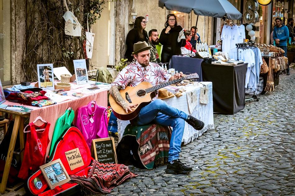 Lx Factory Lisbon artist singing at guitar