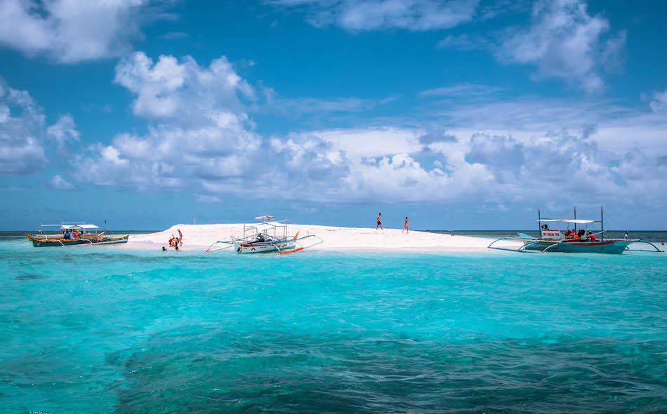 Boats at Naked Island, Siargao, the Philippines. Naked Island photography, Naked Island Philippines,
