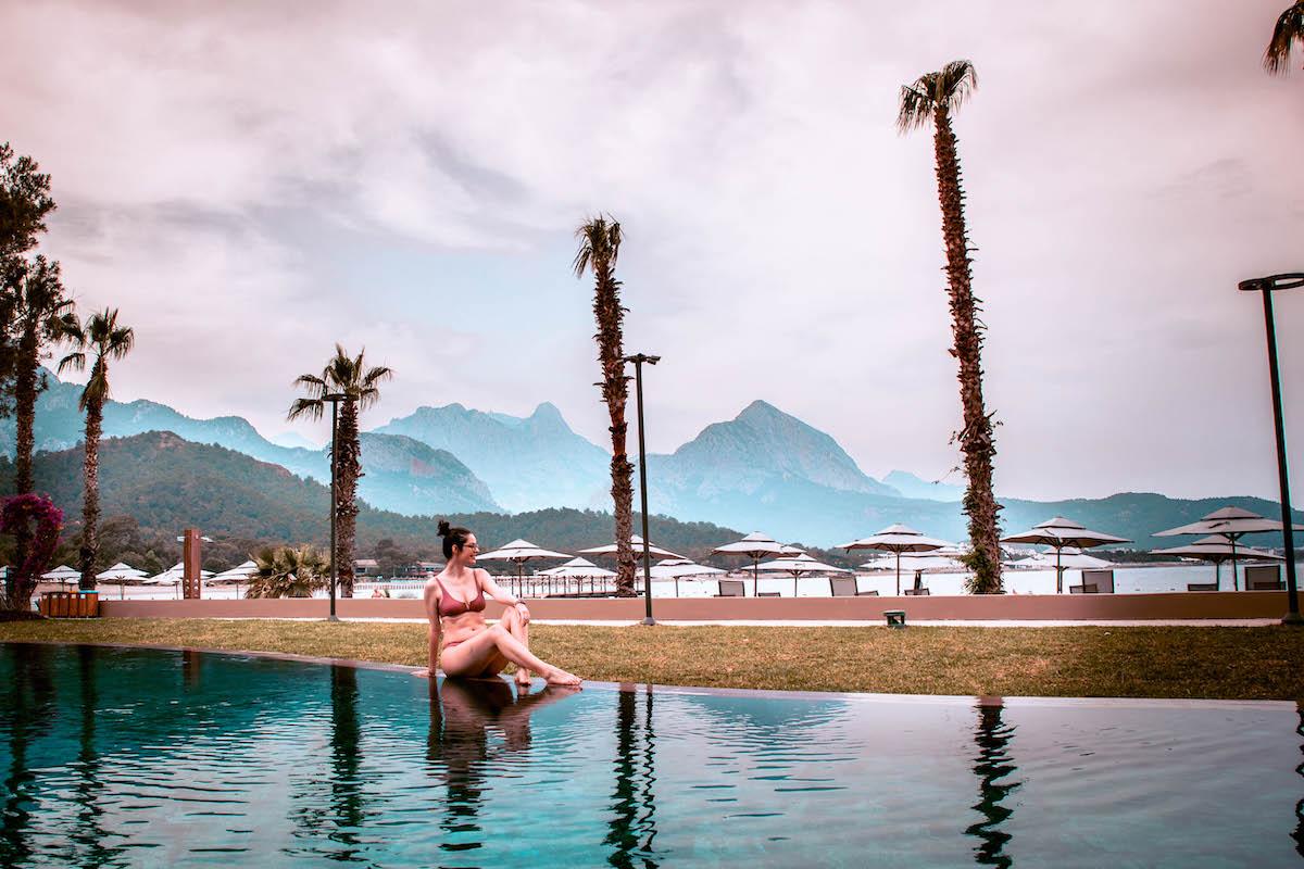 Ng Phaselis Bay Hotel Antalya heated pool and palm trees