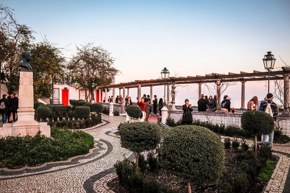 Miradouro de Santa Luzia garden in Lisbon at sunset