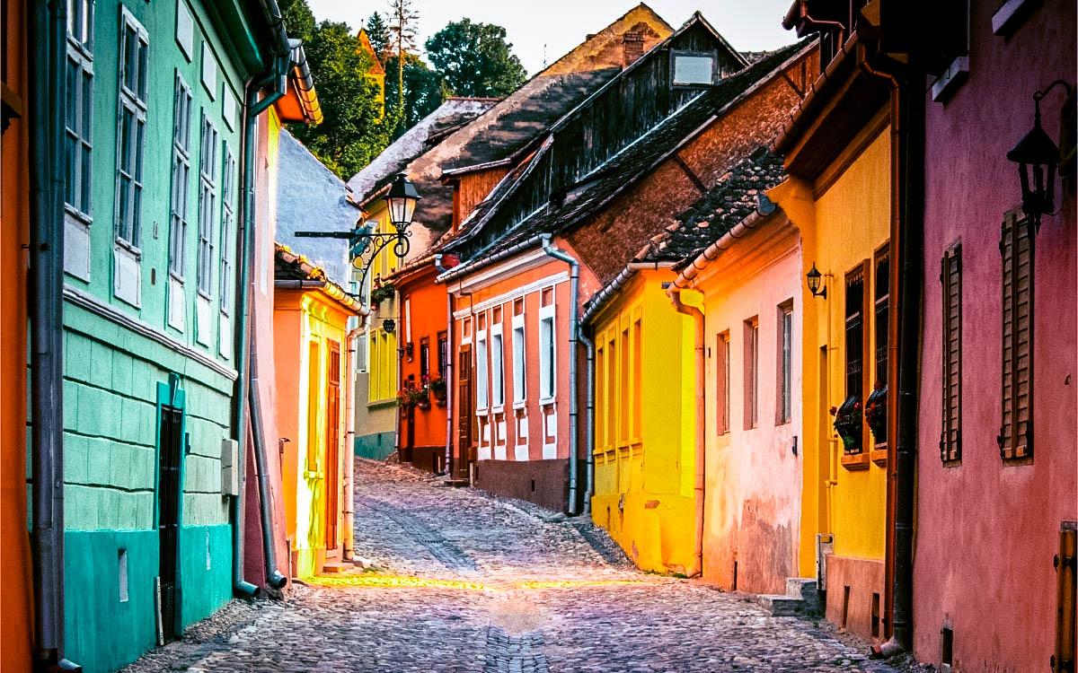 Street of Sighisoara, Romania - most colorful destinations in the world, vibrant cities, colorful cities, colorful earth, vibrant places around the world