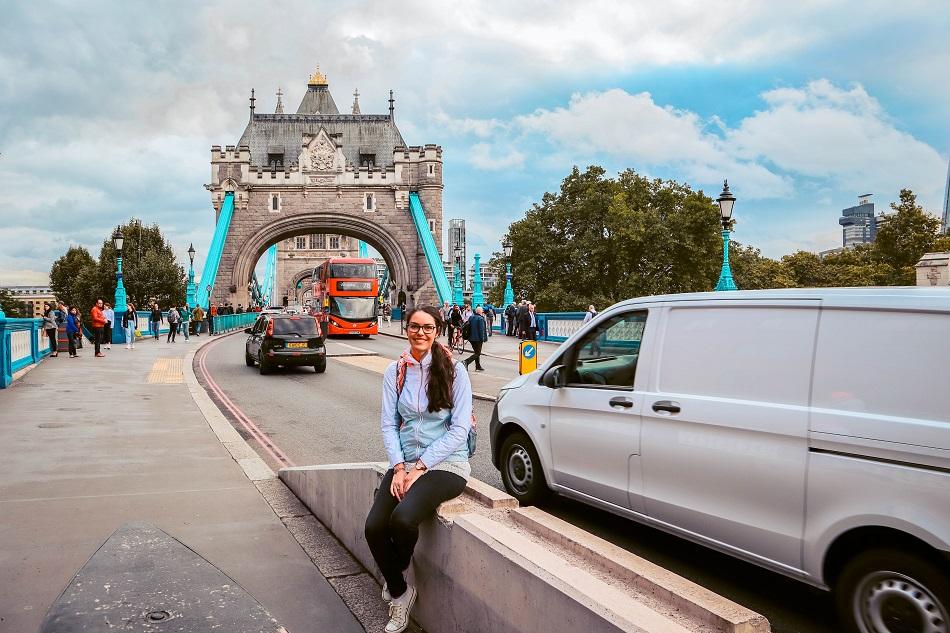 Girl in front of Tower Bridge, London