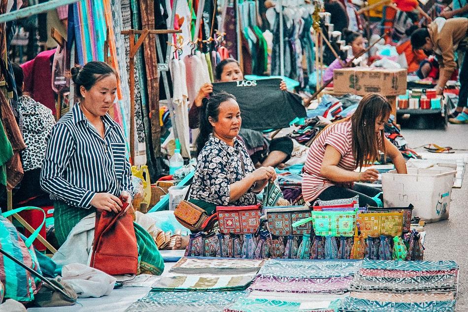 Vientiane night market local merchants selling souvenirs