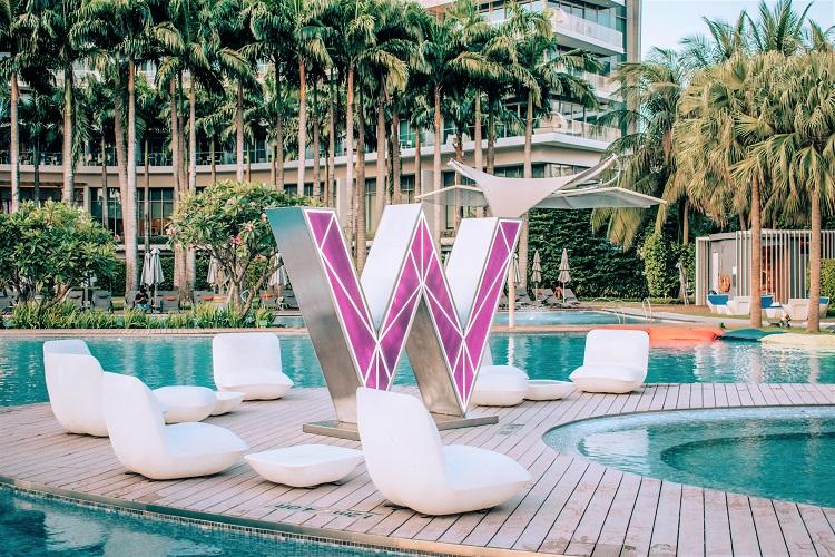 W Singapore Sentosa Cove Hotel pool and W sign