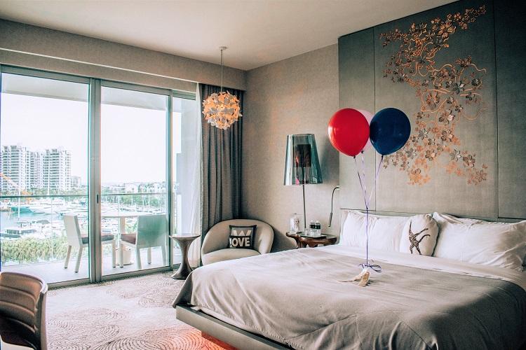 W Singapore Sentosa Cove Hotel room interior with focus on bed