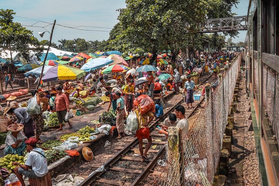 Yangon Circular Train market - people selling vegetables